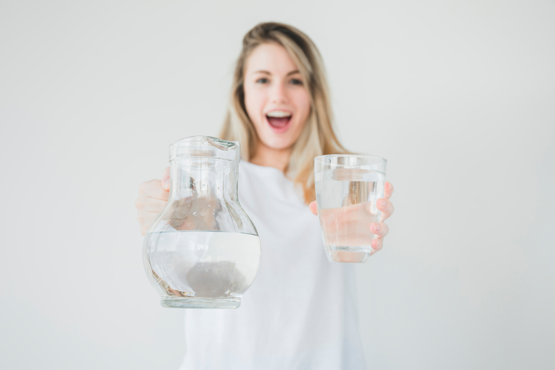 blonde-girl-holding-jar-glass-water